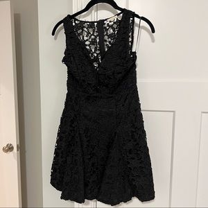 Little black dress! Lace with zip back and tie up front